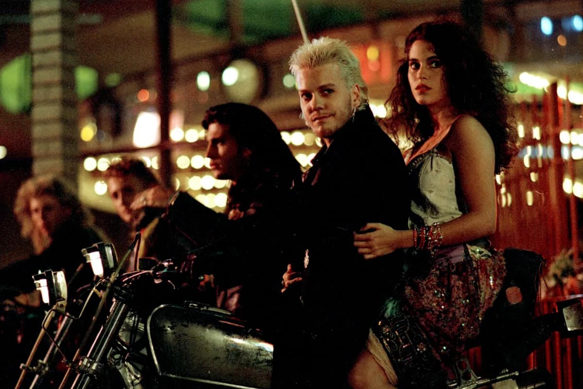 Neon-lit coastal boardwalk artwork inspired by The Lost Boys